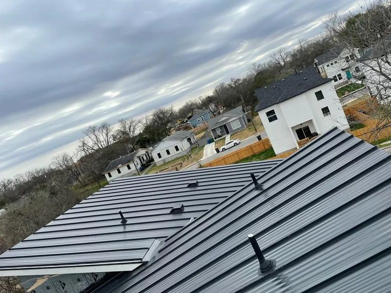 Standing seam metal roof panels with vents for Skylight Repair in Lake Ridge